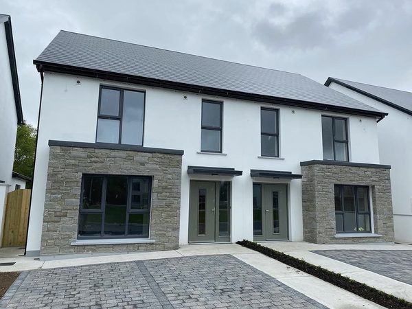 Pair of new homes with Liscannor stone facades, Barters Wood