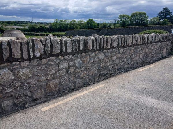 Dry stone wall with upright coping rebuilt on the Celtic Interconnector route, Co. Cork