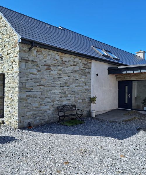 Natural stone farmhouse elevation, Co. Cork