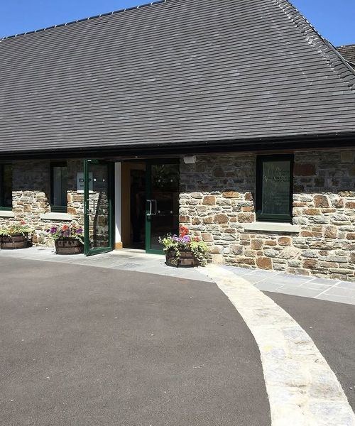 Stone house frontage with granite window heads, Co. Cork