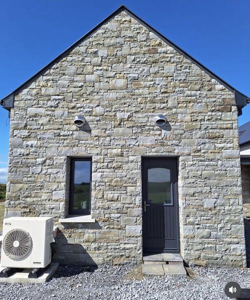 Stone-faced house with recessed entrance, Co. Cork